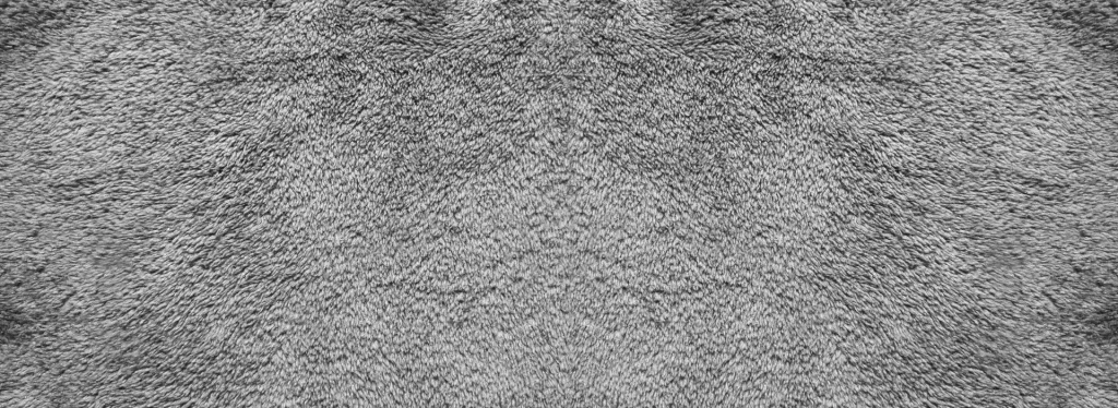 dark-traffic-lanes-in-carpet-fibre-texture