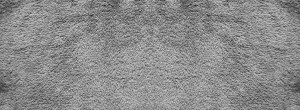 dark-traffic-lanes-in-carpet-fibre-texture